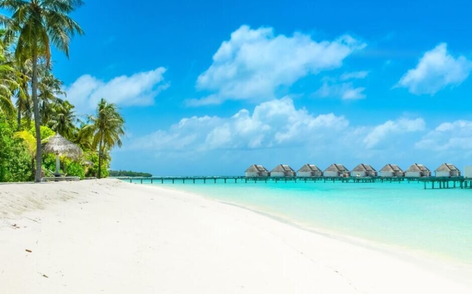 Beautiful panoramic landscape of over water villas, Maldives island, Indian Ocean