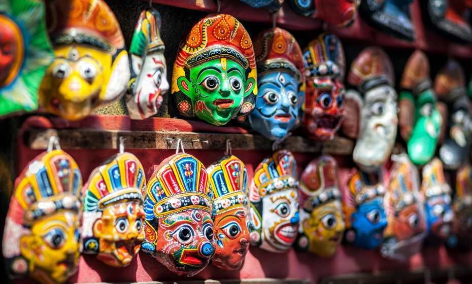 Souvenir masks with Hindu deities on the wall in the shop of Bhaktapur, Kathmandu Valley, Nepal