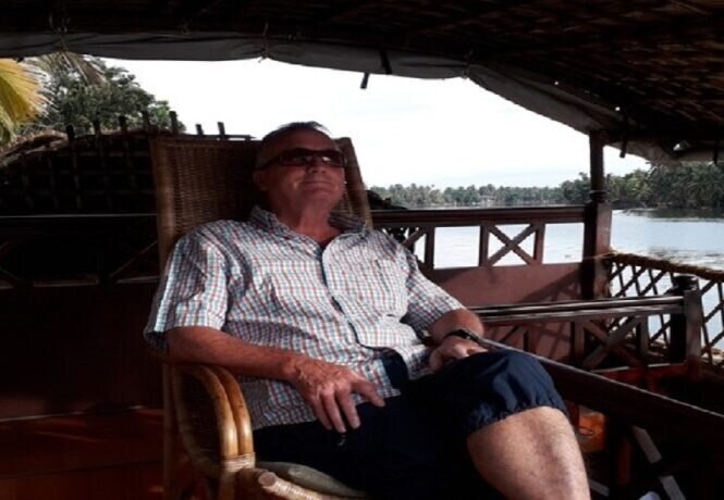 Client Phil relaxing aboard a houseboat in Kerala