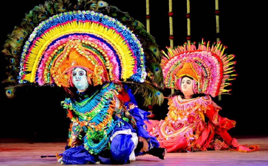 Brightly coloured Chhau dancers from wikimedia