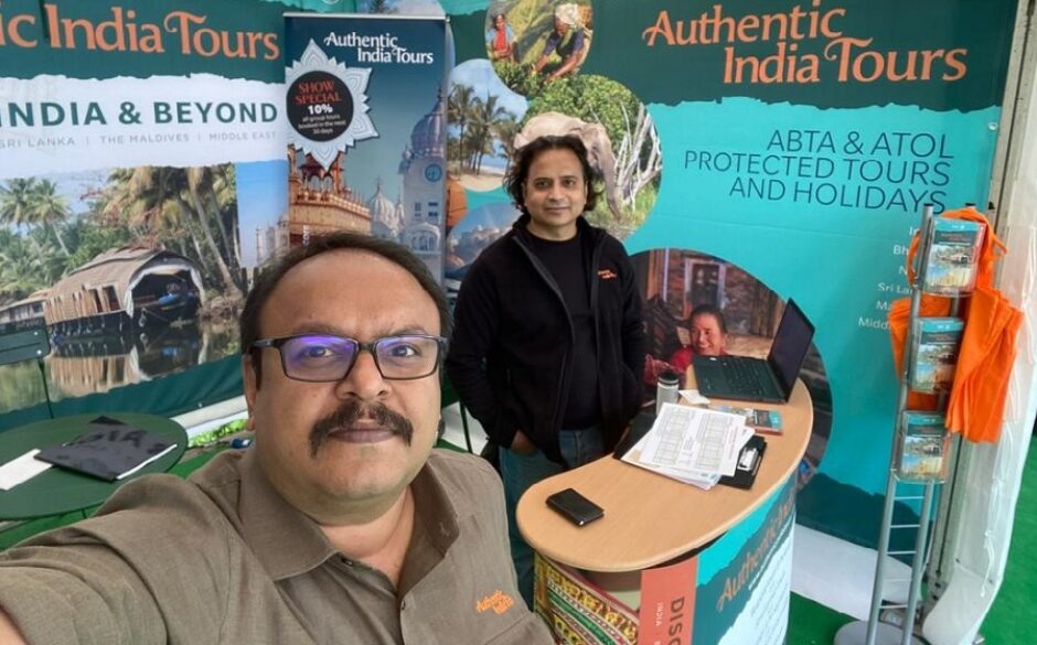 Authentic India Tours staff members Vimal and Brijesh on the stand at the Hay Festival in 2022.
