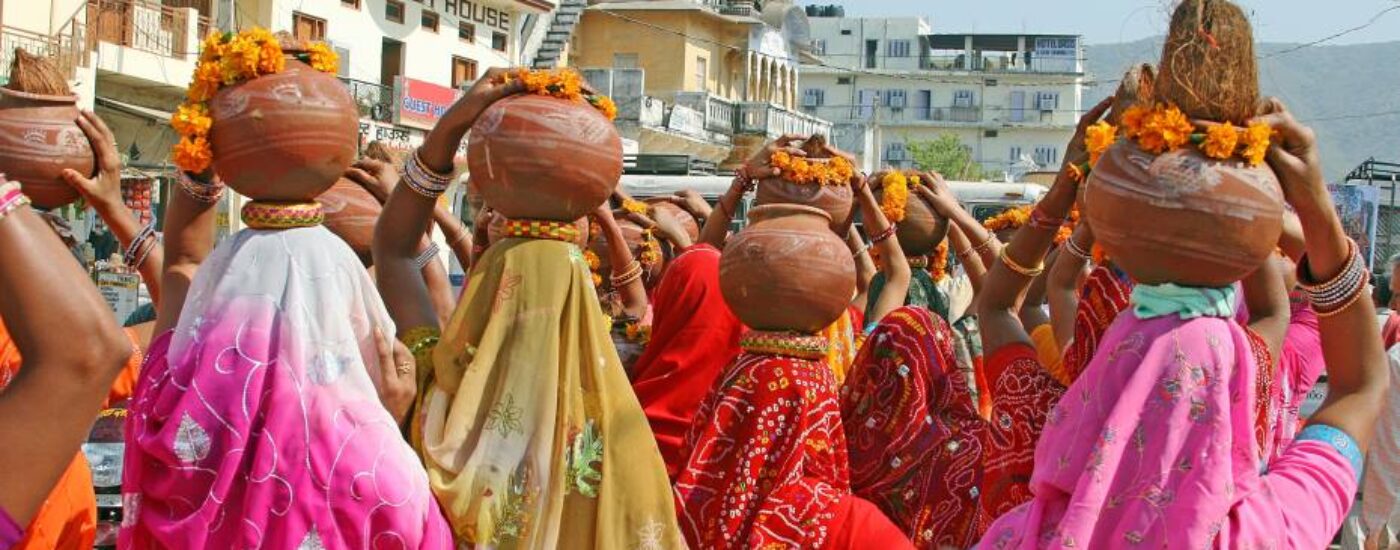 Colourful ladies with pots at Pushkar Rajasthan