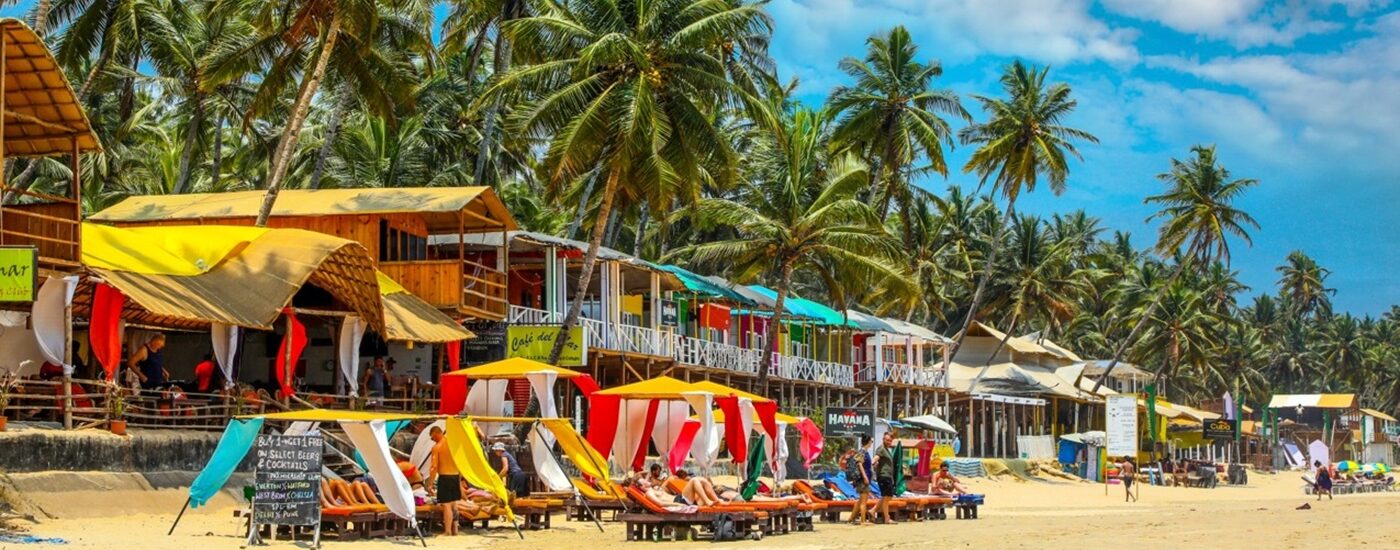 A beach is part of the perfect Goa Holiday - miles of golden sand and palm trees