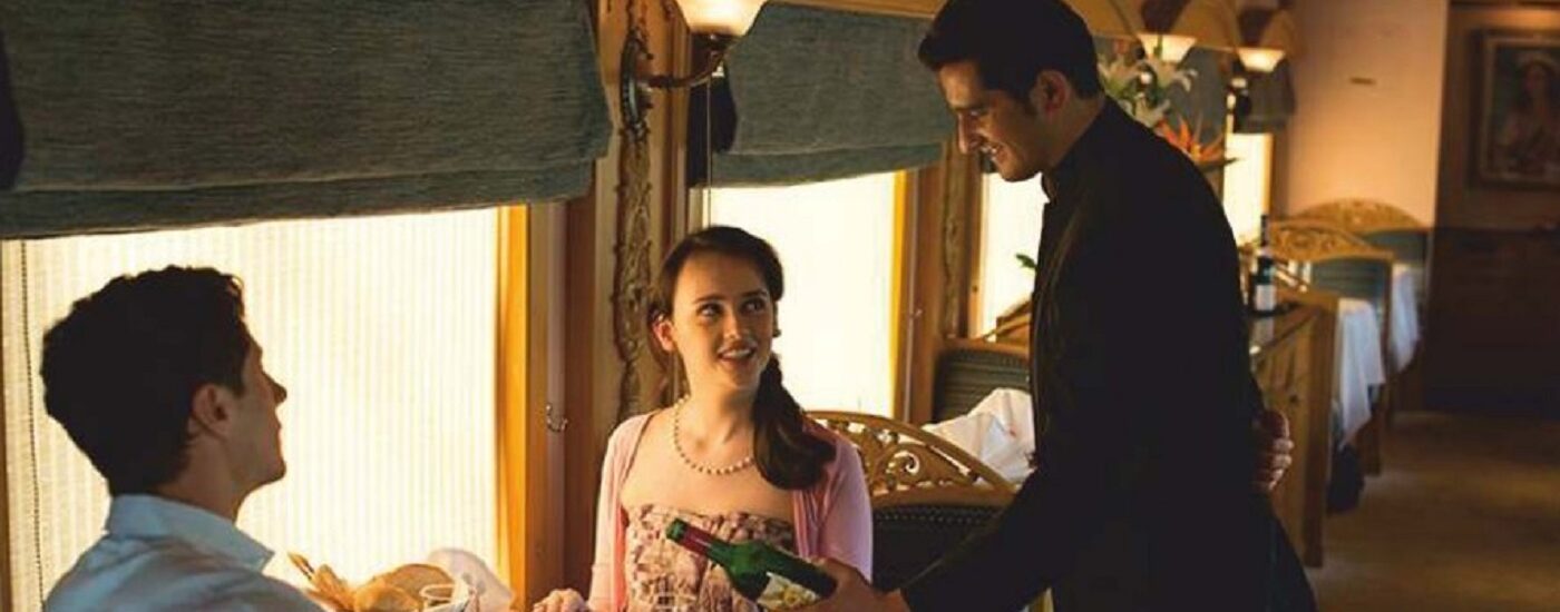 Luxury Train Tours Banner- a couple dining in style on the Deccan Odyssey